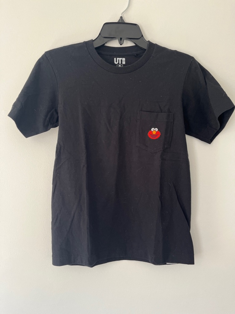 Uniqlo x KAWS Black Pocket Tee with Red Character Embroidery